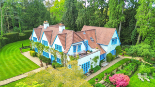 Secluded house surrounded by mature gardens in Hampshire.