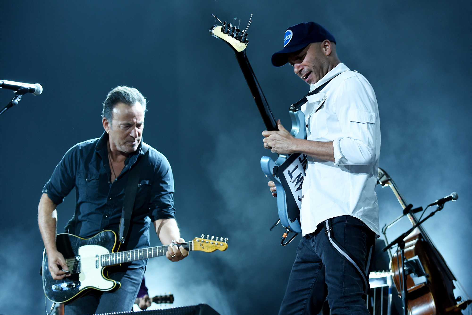 Bruce Springsteen (L) and Tom Morello onstage at the 25th anniversary MusiCares 2015 Person Of The Year Gala honoring Bob Dylan at the Los Angeles Convention Center on February 6, 2015 in Los Angeles, California. The annual benefit raises critical funds for MusiCares' Emergency Financial Assistance and Addiction Recovery programs. For more information visit musicares.org.