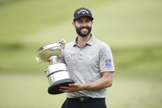 Adam Hadwin poses with the Rivermead Cup trophy after being the lowest scoring Canadian during The Open Qualifying Series