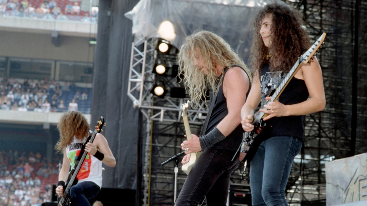 Bassist Jason Newsted, Singer and guitarist James Hetfield and guitarist Kirk Hammett of the heavy metal quartet "Metallica" perform onstage at the "Monsters of Rock" festival in 1988