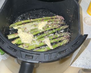 Dreo air fryer review air fryer cooking asparagus in