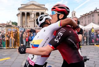 Team Ineos' Ecuadorian Jhonatan Narvaez (L) is congratulated by Team Ineos' British rider Geraint Thomas (R) after he won the stage 1 of the Giro d'Italia 2024 cycling race, 140 km between Venaria Reale and Turin on May 4, 2024. The 107th edition of the Giro d'Italia, with a total of 3400,8 km, departs from Veneria Reale near Turin on May 4, 2024 and will finish in Rome on May 26, 2024. (Photo by Fabrio Ferrari / POOL / AFP)