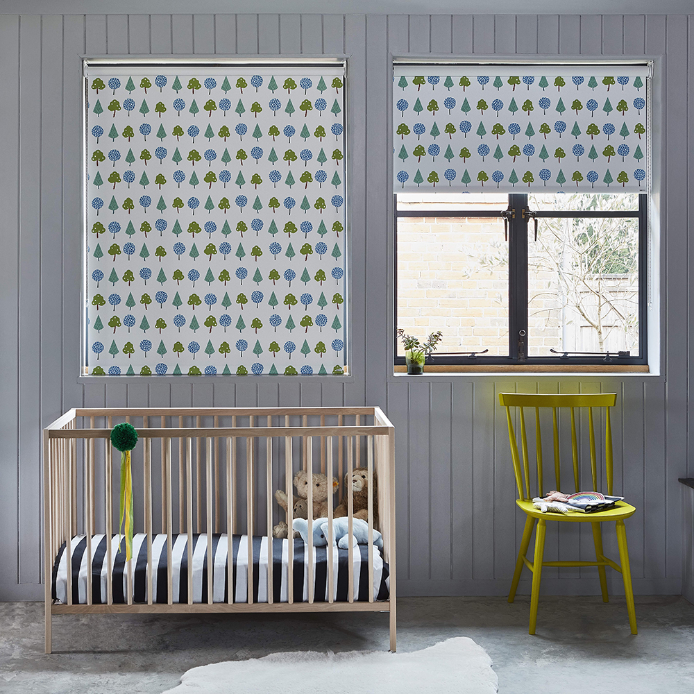 room with yellow chair and wooden cradle