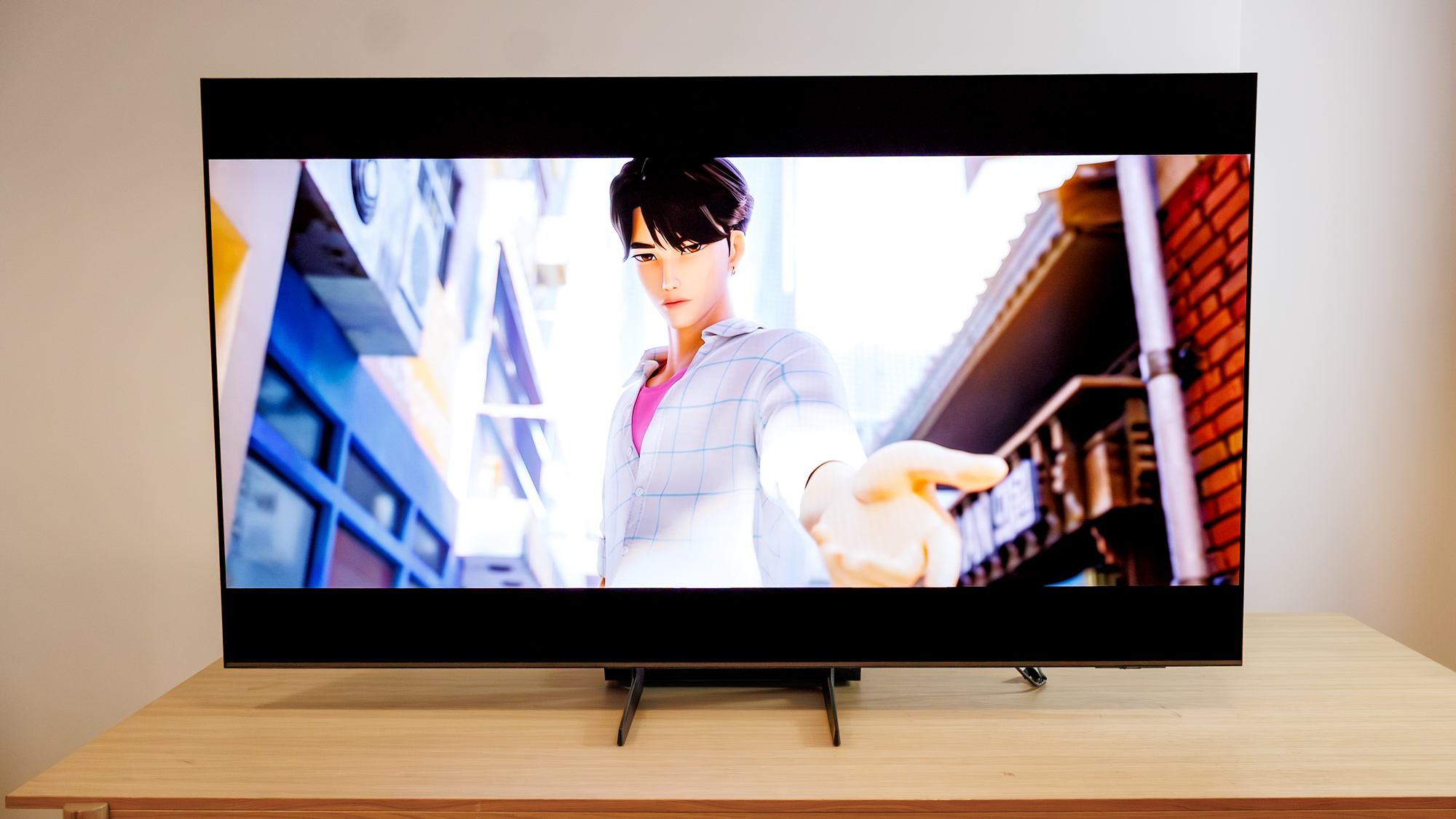 Samsung OLED S85F TV on a table