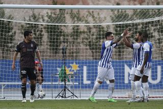 Miguel De La Fuente (2nd L) of Deportivo Alaves celebrates with his team mates after scoring a goal during friendly match between Besiktas and Deportivo Alaves at Estadi Olimpic Camilo Cano Stadium in Alicante, Spain on July 26, 2022.