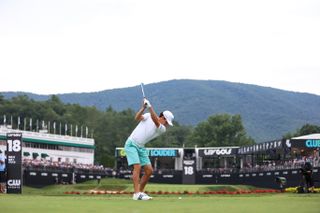 Joaquin Niemann at the top of his back swing