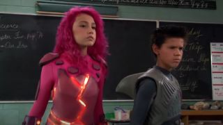 Sharkboy and Lavagirl standing in a classroom in Sharkboy and Lavagirl. 