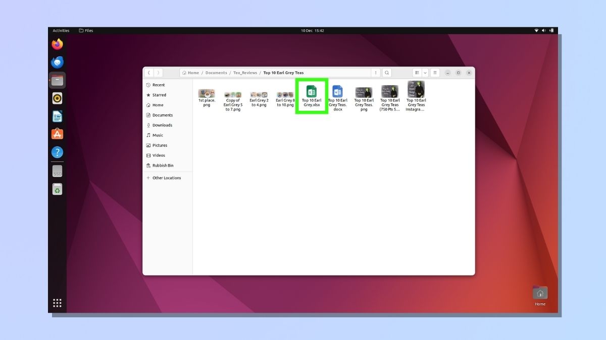 Снимок экрана, показывающий, как переименовать файл в Linux: откройте папку в приложении Distro Files.