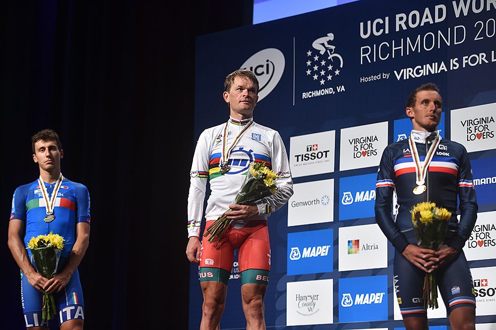 Vasil Kiryienka (Belarus) listens to his national anthem on the podium after winning the elite men's time trial