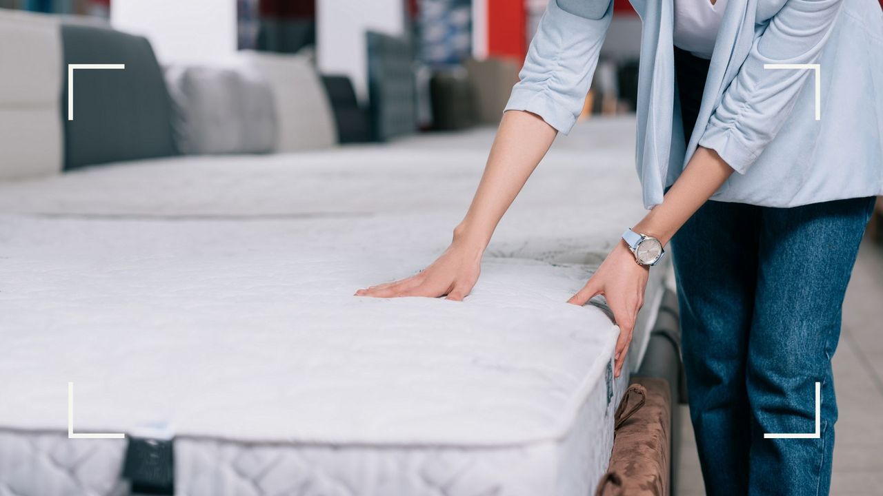 person testing mattresses in a store to demonstrate an article answering the question &#039;how often should you change your mattress&#039;