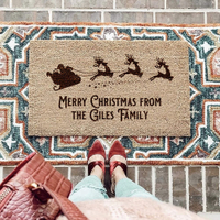 Personalised Santa's Sleigh Family Door Mat: £34.95, Amazon