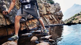 how to use trekking poles: river crossing with poles