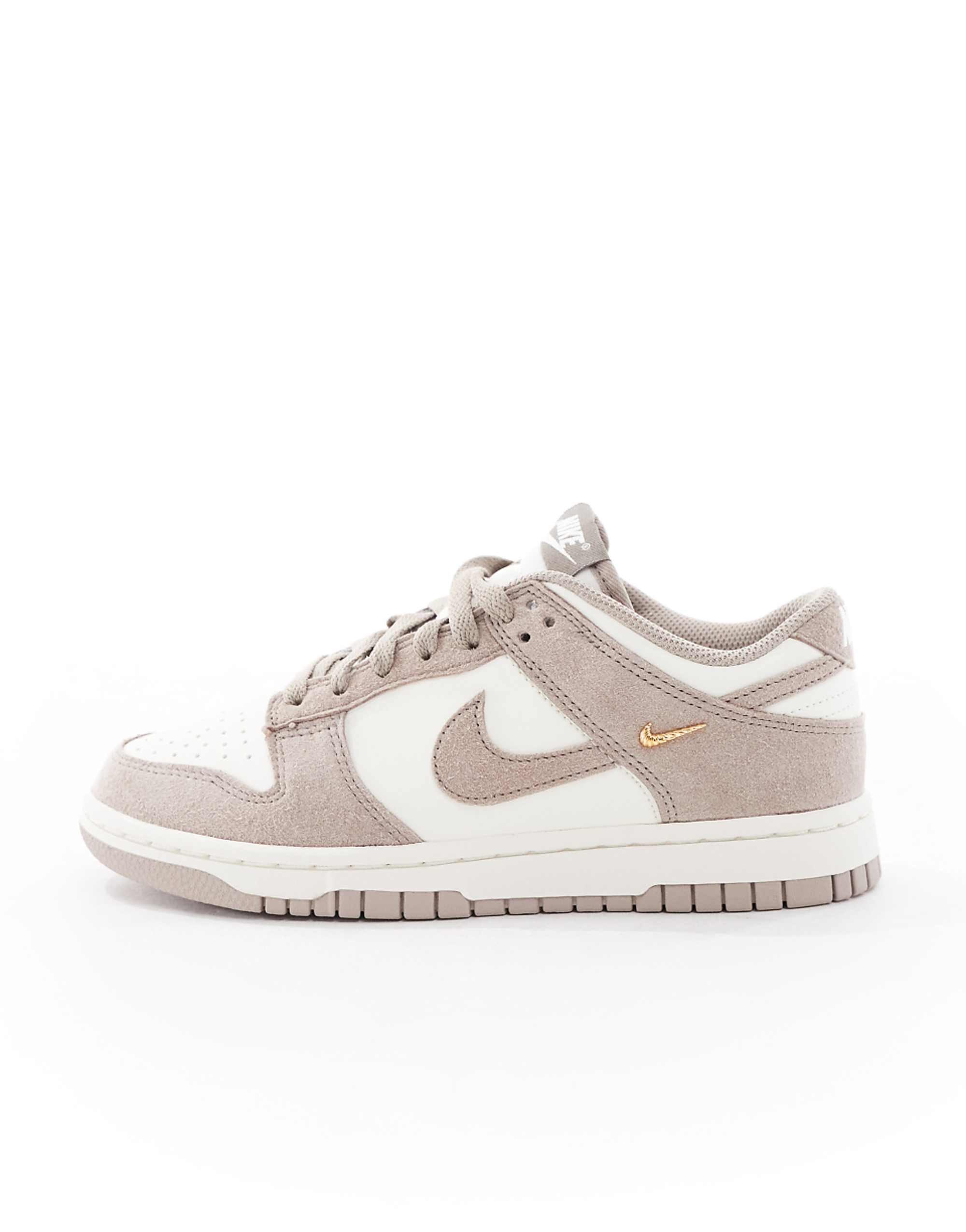 Nike Dunk Low Trainers in White and Beige