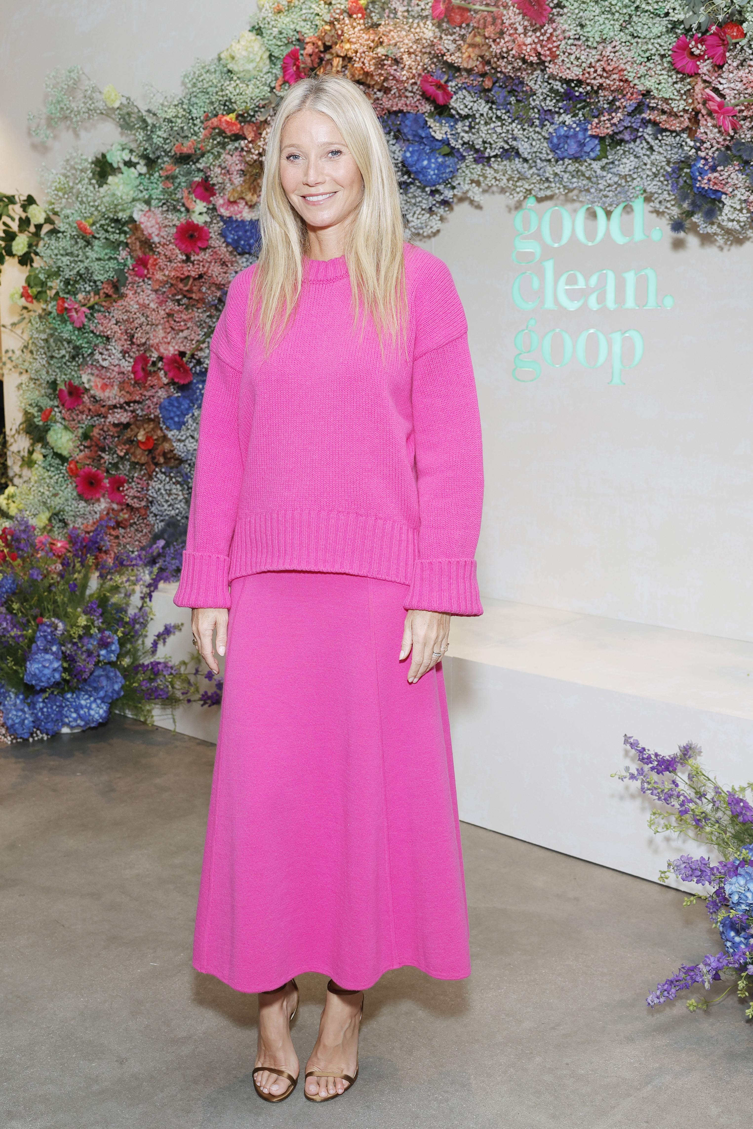 Gwyneth Paltrow wore a neon pink skirt set at a goop event