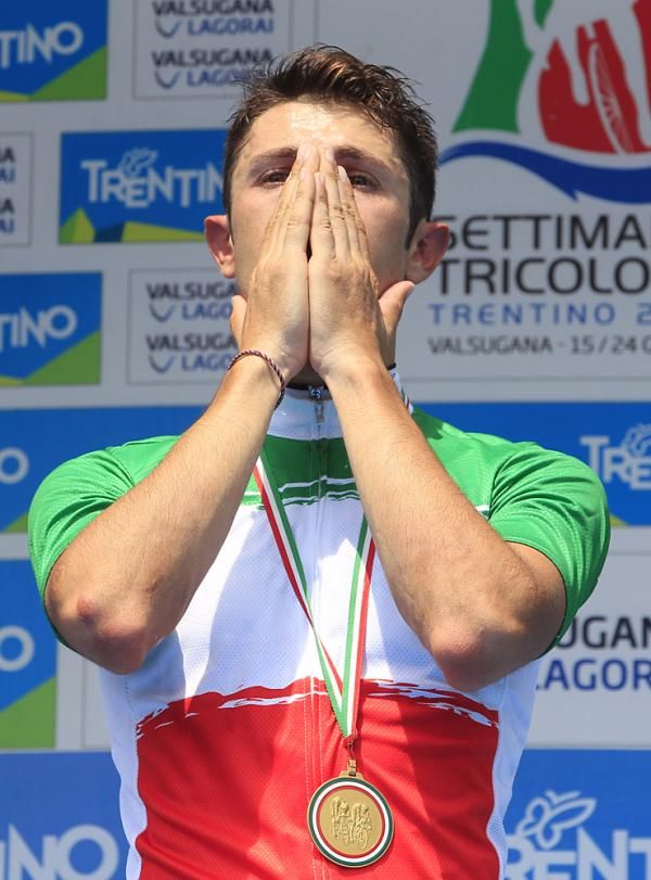 Dario Cataldo (Omega Pharma-Quickstep) savors his moment on the podium