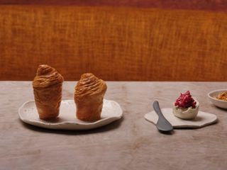 House-laminated sourdough bread, whipped butter, fermented redcurrant, winter spices