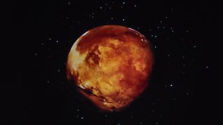 A photo of a projection of Mars from the Pococo projector
