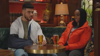 Nate and Naomi looking awkward in the pub