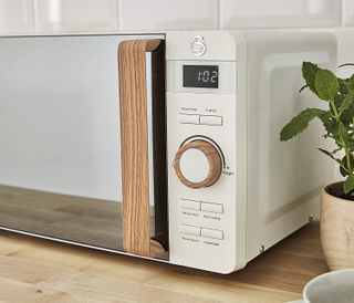Swan Nordic Digital white Microwave controls on kitchen counter