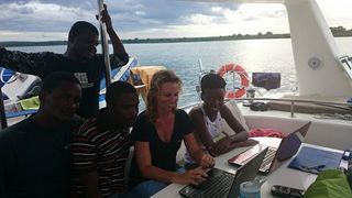 WCS conservationist Gill Braulik and her colleagues search for dolphins and whales off the coast of Tanzania.