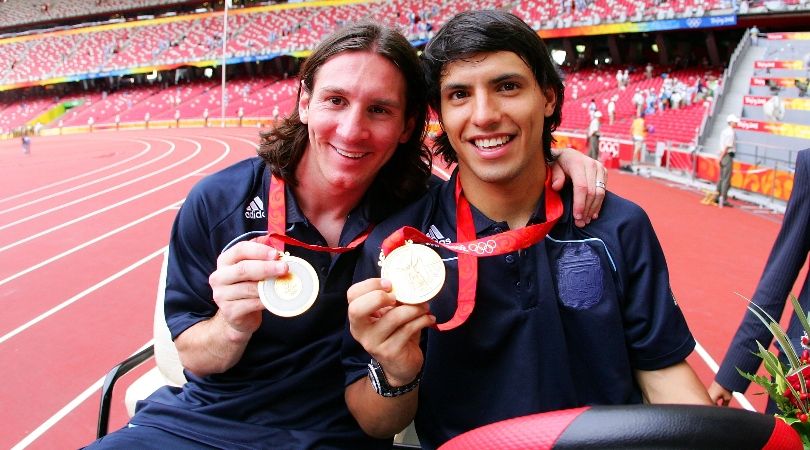 Lionel Messi and Sergio Aguero show off their gold medals after winning the football tournament with Argentina at the 2008 Olympics in Beijing.