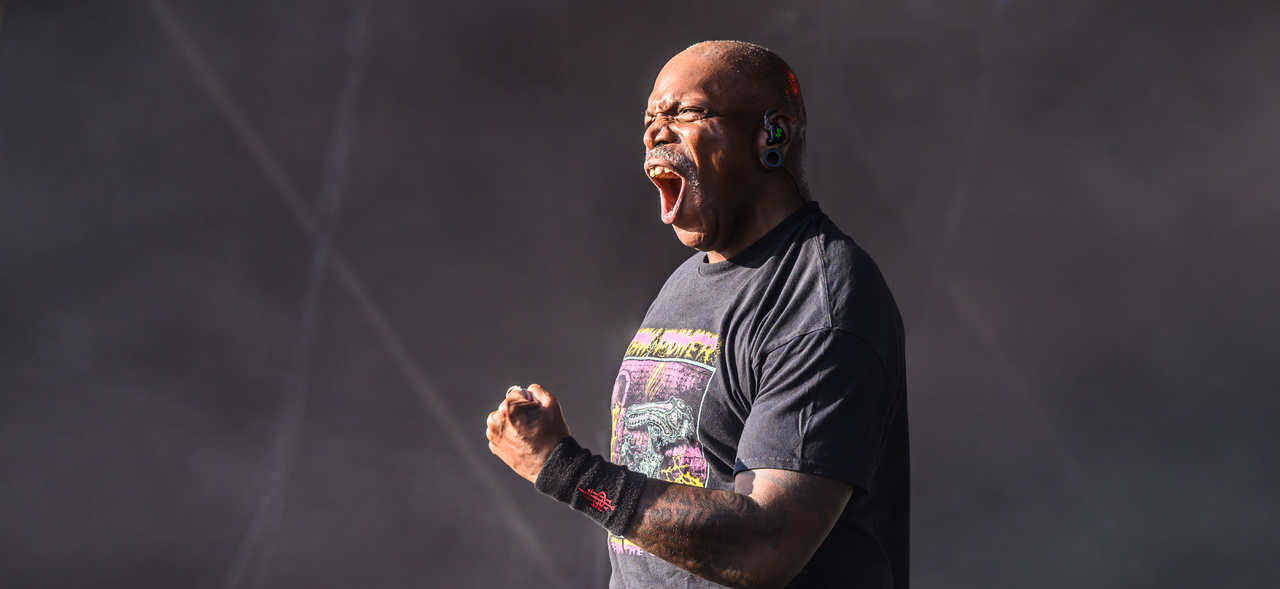 Derek Green roaring on stage