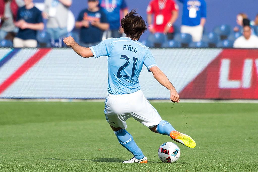 Midfielder Andrea Pirlo #21 of New York City FC kicks the ball forward during the match vs Vancouver Whitecaps at Yankee Stadium on April 30, 2016 in New York City. New York city FC won 3-2.