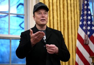 Elon Musk during an executive order signing in the Oval Office