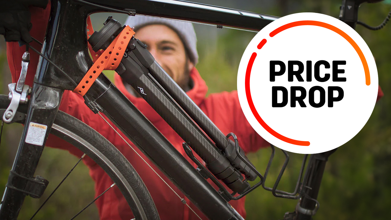 Peak Design Travel Tripod, attached to a bicycle, with the text "Price Drop"