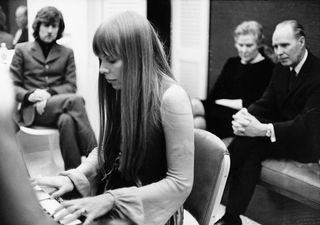 Joni Mitchell backstage at New York's Carnegie Hall With Graham Nash and her Parents on February 1, 1969