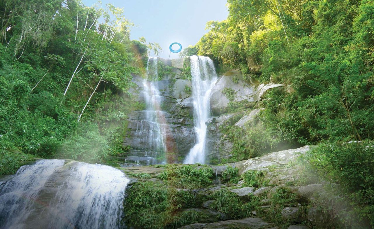 Ring: One with Nature is a luminous artwork suspended at the top of the 58m-high Véu da Noiva waterfall in Brazil and created by Japanese artist Mariko Mori