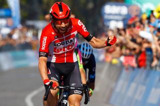 Team Lottos Belgian rider Thomas De Gendt celebrates as he crosses the finish line to win the 8th stage of the Giro dItalia 2022 153 kilometers between Napoli and Napoli southwestern Italy on May 14 2022 Photo by Luca Bettini AFP Photo by LUCA BETTINIAFP via Getty Images