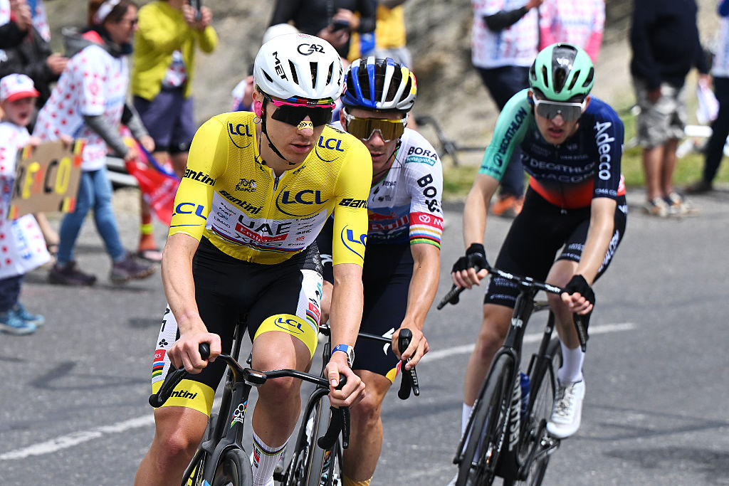 ALPE D&amp;amp;apos;HUEZ, FRANCE - JULY 25: (L-R) Tadej Pogacar of Slovenia and UAE Team Emirates - XRG - Yellow Leader Jersey, Remco Evenepoel of Belgium and Team Red Bull - BORA - hansgrohe and Paul Seixas of France and Decathlon CMA CGM Team compete climbing to the Col du Galibier (2642m) during the 113th Tour de France 2026, Stage 20 a 170.9km stage from Le Bourg d&amp;amp;apos;Oisans to Alpe d&amp;amp;apos;Huez 1842m / #UCIWT / on July 25, 2026 in Alpe d&amp;amp;apos;Huez, France. (Photo by Dario Belingheri/Getty Images)