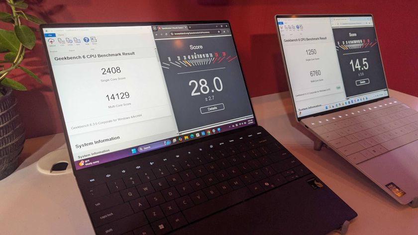 Dell XPS 13 laptops side by side showing Snapdragon vs Intel Geekbench scores