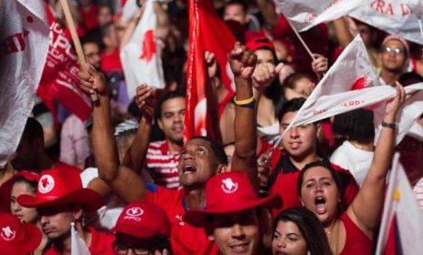 Puerto Rican supporters of Governor-elect Garcia Padilla celebrate his win on election day: A majority of voters also cast ballots in favor of becoming America&amp;#039;s 51st state.