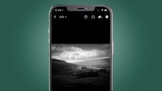 An iPhone showing the a landscape photo in the Lightroom app