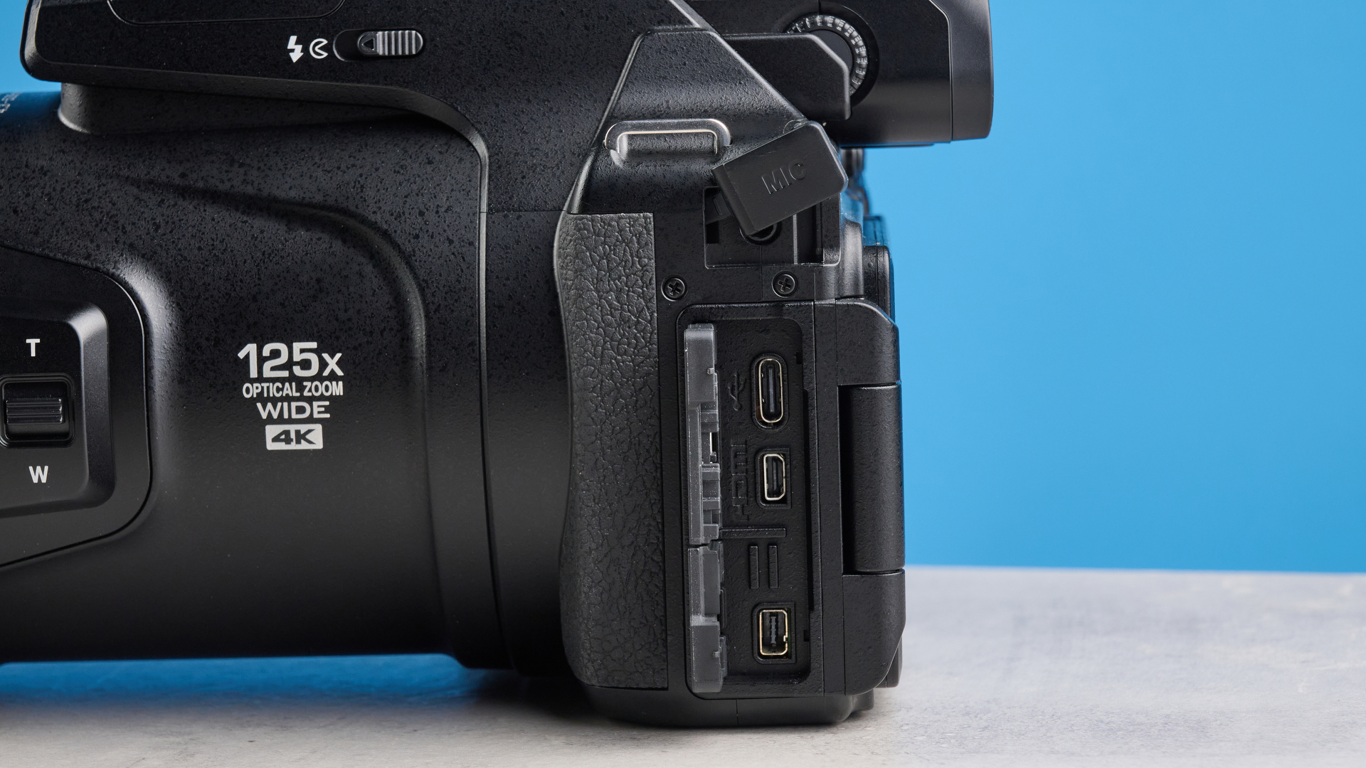 A black Nikon Coolpix P1100 digital camera