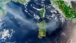 satellite photo of smoke from canadian wildfires drifting over sardinia in the mediterranean