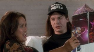 Tia Carrere and Mike Myers in Wayne's World 2
