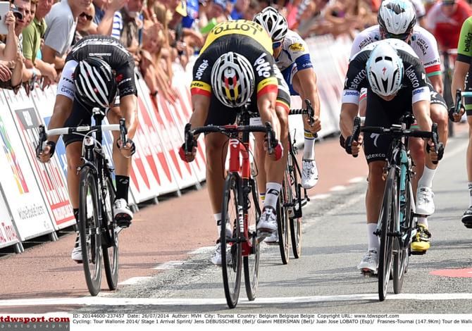 Jens Debusschere (Lotto Belisol) throws the bike for the win