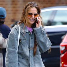 Katie Holmes wears a denim jacket 