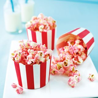 pink pop corn in paper container