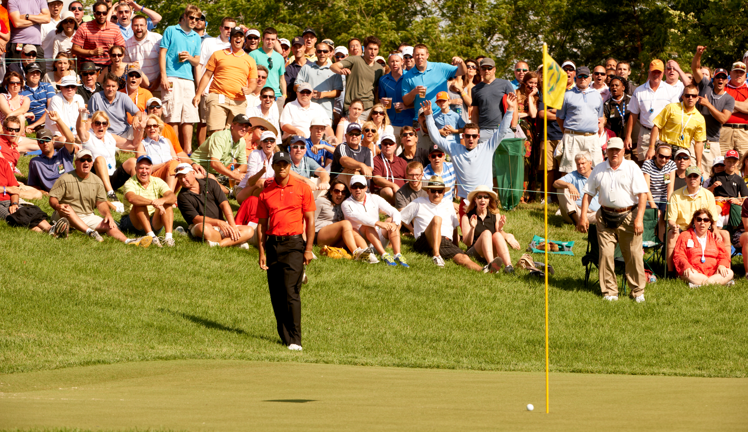 Tiger Woods hits a flop shot