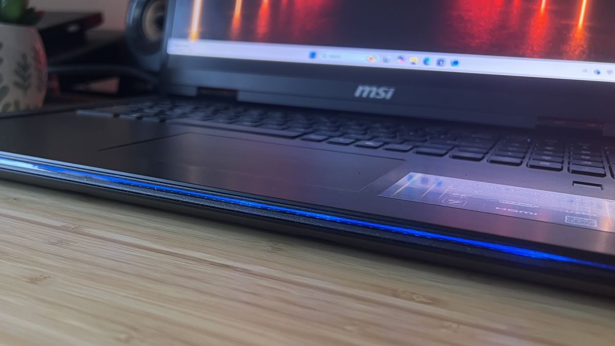 Front lip of MSI Raider A18 HX gaming laptop with slim line of RGB lighting enabled