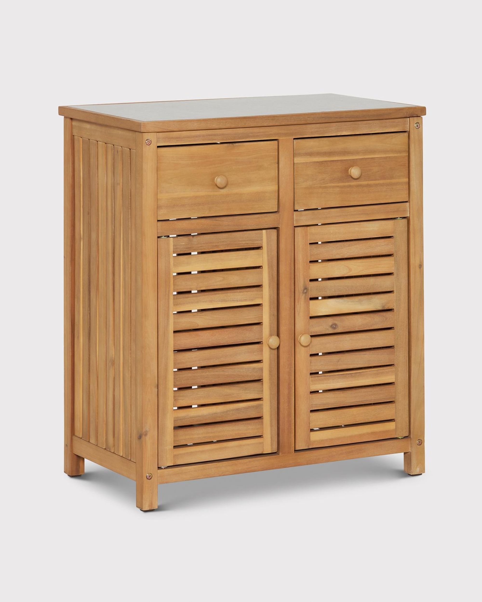 An outdoor wooden kitchen unit with a light gray worktop, two drawer, and two cupboards.