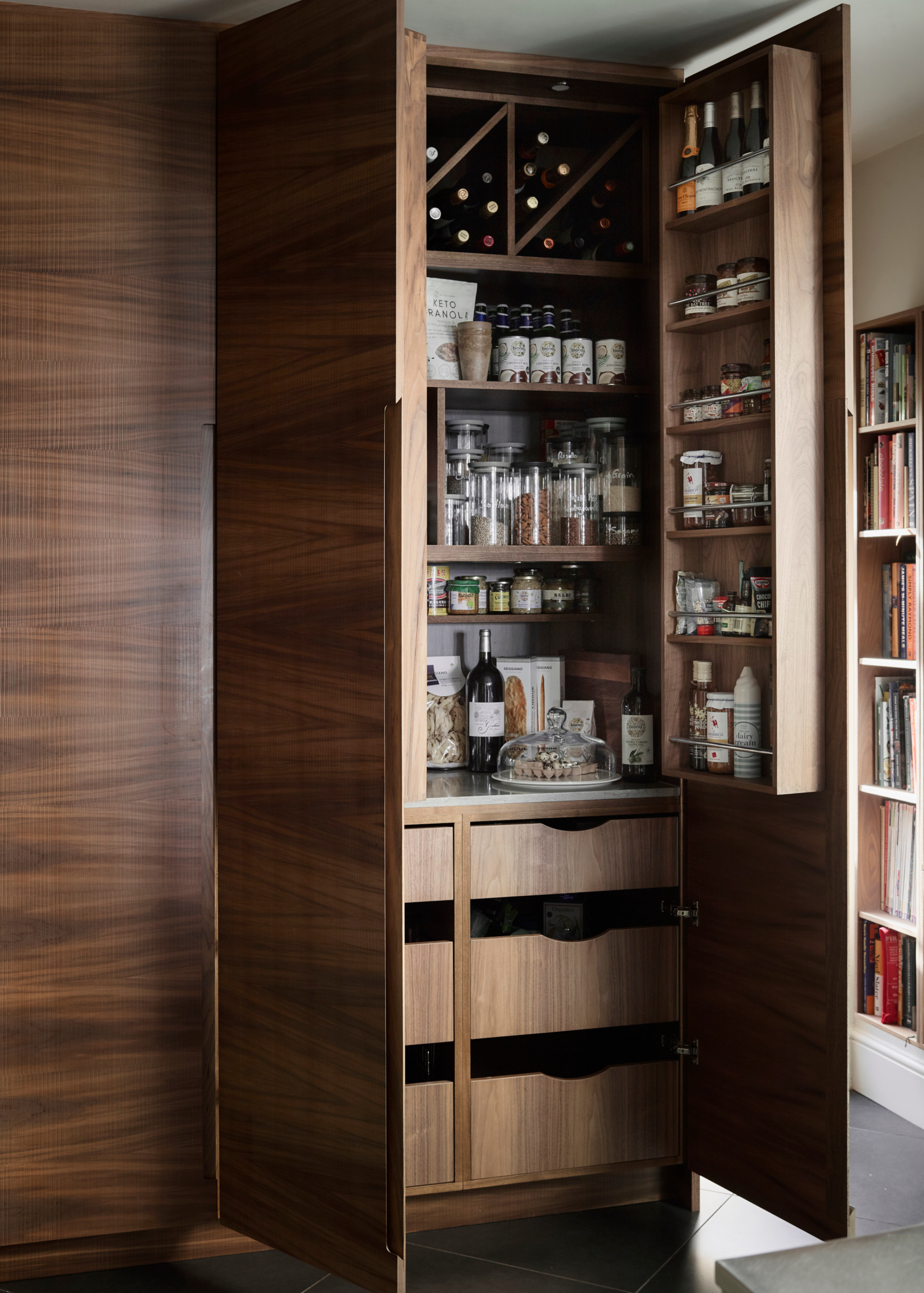 wooden larder cabinet with lots of storage and drawers within