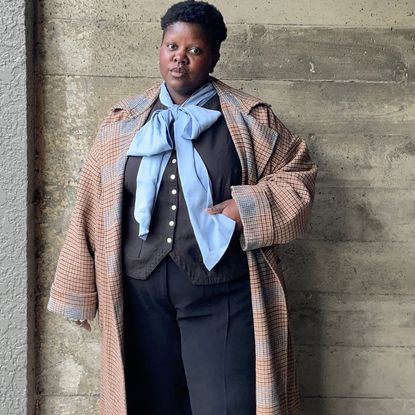 Lydia Okello wearing an outfit inspired by mens fashion week street style