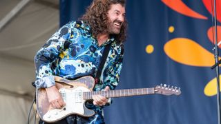 Tab Benoit performs with Voice of the Wetlands AllStars during 2022 New Orleans Jazz & Heritage Festival at Fair Grounds Race Course on May 01, 2022 in New Orleans, Louisiana.