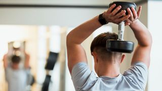 Man working out with a dumbbell