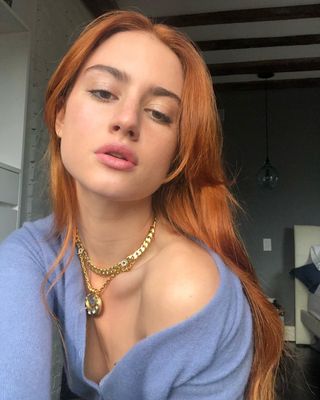 Actress Grace Van Patten with copper hair